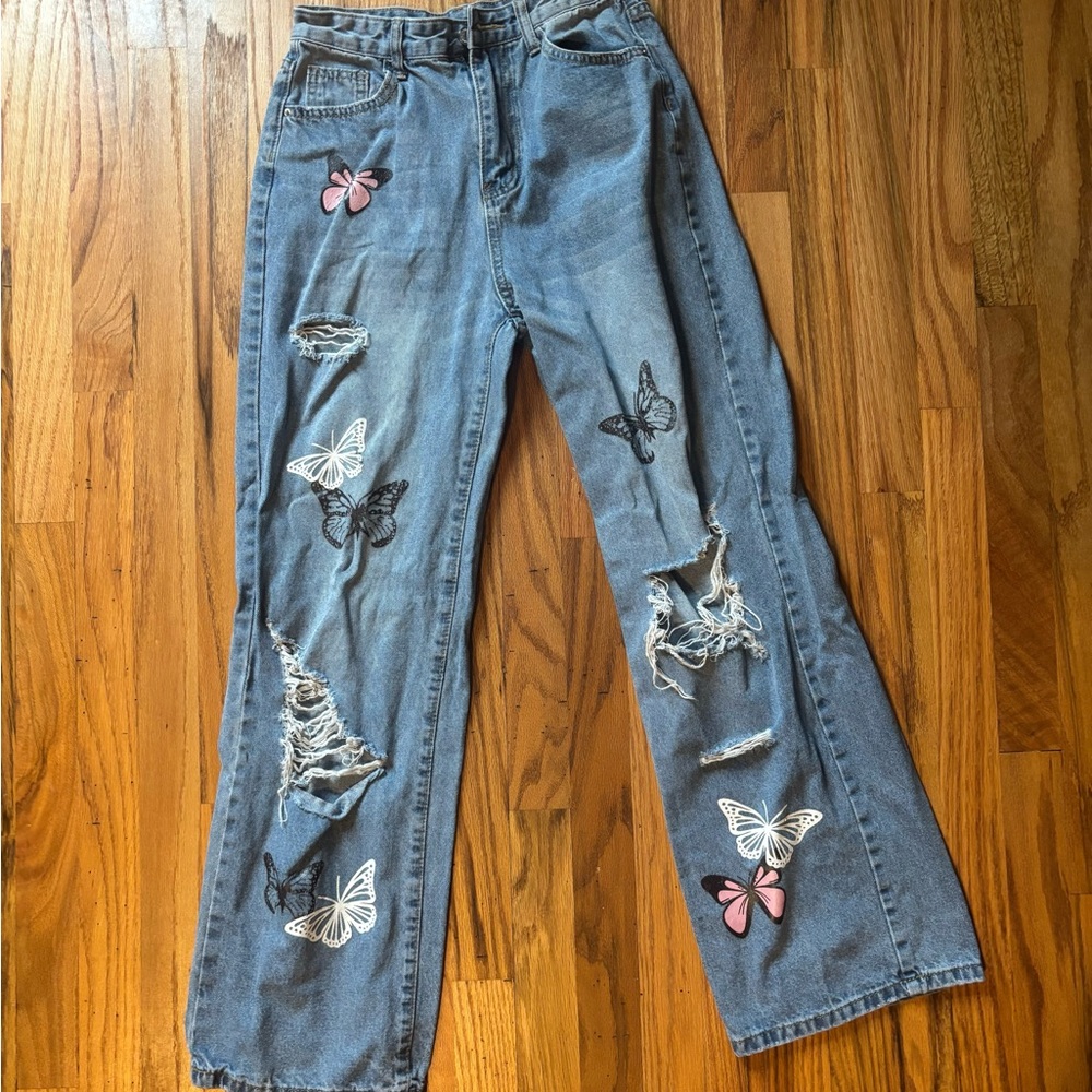 Women's Blue Distressed Jeans with Butterfly Accents